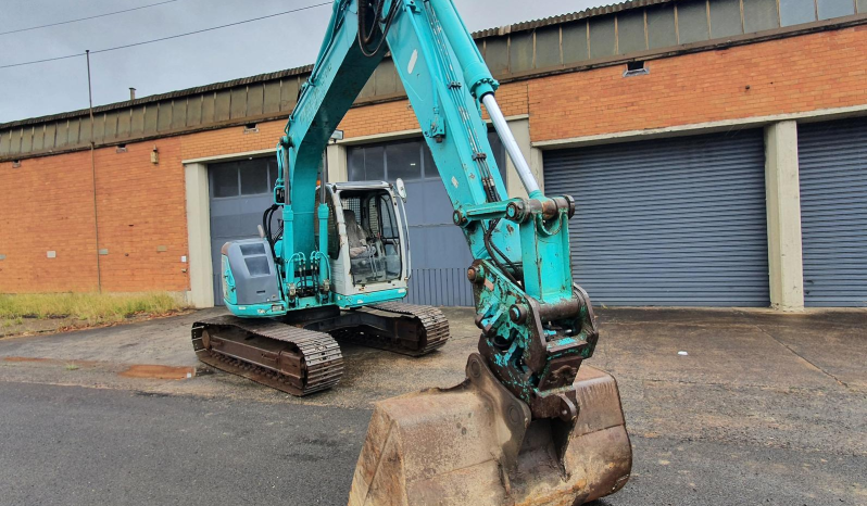 
								Used 2005 Kobelco 135SR full									